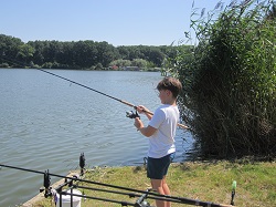 Fischer beim Drillen